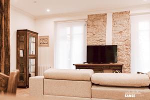 Televízia a/alebo spoločenská miestnosť v ubytovaní Apartamento San Marcial by SanSe Holidays