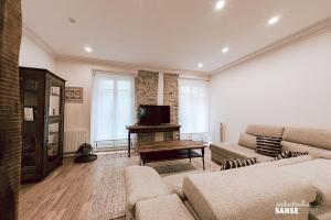 Televízia a/alebo spoločenská miestnosť v ubytovaní Apartamento San Marcial by SanSe Holidays