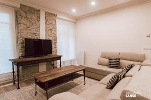 Televízia a/alebo spoločenská miestnosť v ubytovaní Apartamento San Marcial by SanSe Holidays