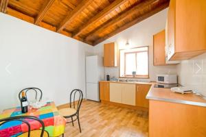 Kuchyňa alebo kuchynka v ubytovaní La casa del bisa