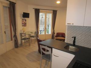 Kuchyň nebo kuchyňský kout v ubytování Hotel Apartaments Gesòria Porta Ferrada + 29 fotografií