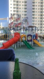 a playground with a water park with a slide at Salinas Exclusive Resort in Salinópolis +7 photos