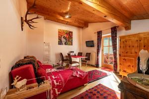 TV a/nebo společenská místnost v ubytování Designer-Chalets