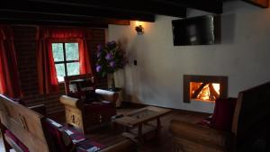 A television and/or entertainment centre at CABAÑAS CASTILLO