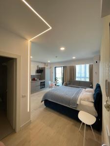 Postel nebo postele na pokoji v ubytování Bel Air Apartments Mamaia Nord + 114 fotografií