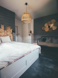 Postel nebo postele na pokoji v ubytování Willa Piwniczka Apartament Jahlowej