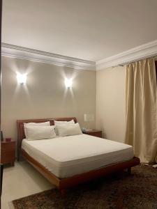 Ένα ή περισσότερα κρεβάτια σε δωμάτιο στο Double A Luxury Apartment