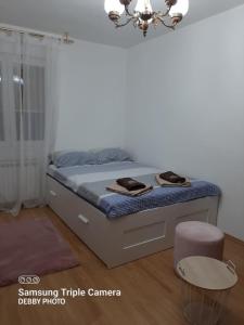 Posteľ alebo postele v izbe v ubytovaní Debby