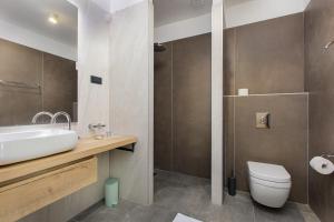 Koupelna v ubytování Hotel Millenium deluxe