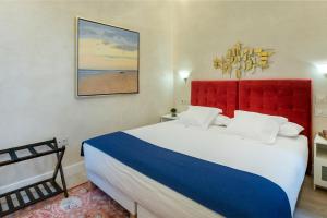 Postel nebo postele na pokoji v ubytování Gadir Suites + 37 fotografií