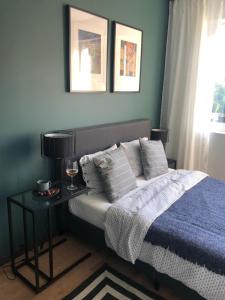 Ένα ή περισσότερα κρεβάτια σε δωμάτιο στο Apartamenty Nadbrzeże 1