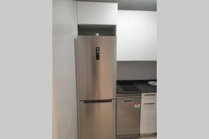 A kitchen or kitchenette at Apartamento recién reformado en Barakaldo