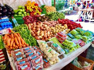 a display of fruits and vegetables in a market at Copacabana Way - 4 Hóspedes, Praia e Privativo in Rio de Janeiro