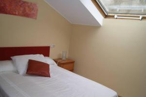 A bed or beds in a room at As Campanillas