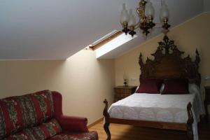 A bed or beds in a room at As Campanillas