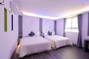 Uma cama ou camas num quarto em Edinburgh 16 Inn