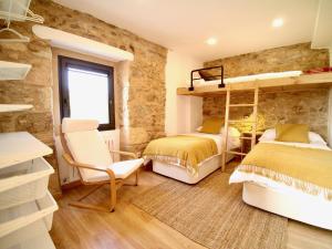 Двухъярусная кровать или двухъярусные кровати в номере The Cliffs - Galleon Amieiro