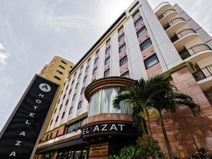 a large building with a sign in front of it at Hotel Azat Naha in Naha