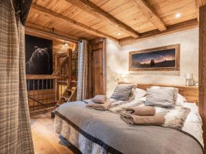 Appartement La Clusaz, 7 pièces, 10 personnes - FR-1-304-216にあるベッド