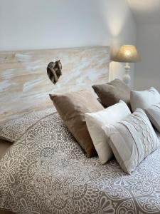 Een bed of bedden in een kamer bij La Romantica**** 4/6 Pers 5kms de Nausicaa
