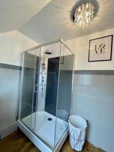 a shower with a glass enclosure in a bathroom at La Romantica**** 4/6 Pers 5kms de Nausicaa in Saint-Étienne-au-Mont