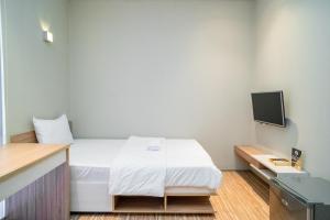 Katil atau katil-katil dalam bilik di Three J Residence