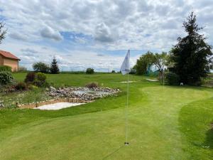 Golf v apartmánu nebo okolí