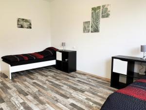 Posezení v ubytování 3 Zimmerwohnung mit Garten