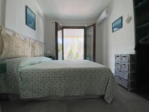 A bed or beds in a room at Casa vacanza Ferrara IUN P5547