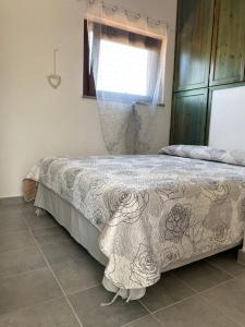 A bed or beds in a room at Casa vacanza Ferrara IUN P5547