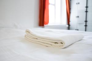 Posteľ alebo postele v izbe v ubytovaní Hostel Mandarinka