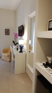 A television and/or entertainment centre at Sorrento ResArt Suite