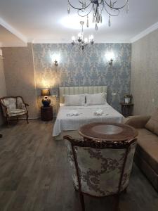 Katil atau katil-katil dalam bilik di Borjomi Classic Hotel