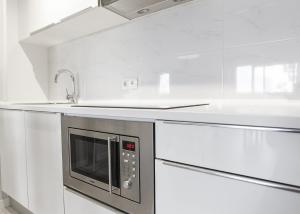 Kuchyňa alebo kuchynka v ubytovaní Apartamentos Stil Mar Anna - L'Escala Stil Mar