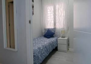 Posteľ alebo postele v izbe v ubytovaní Apartamentos Stil Mar Anna - L'Escala Stil Mar