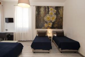 Voodi või voodid majutusasutuse B&B 7 Rooms toas
