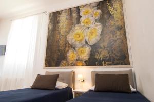 Voodi või voodid majutusasutuse B&B 7 Rooms toas
