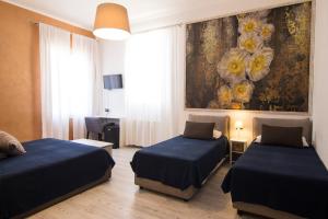 Voodi või voodid majutusasutuse B&B 7 Rooms toas