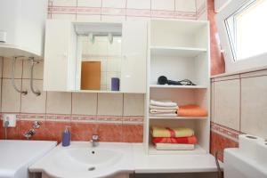 Kylpyhuone majoituspaikassa Apartments A&G