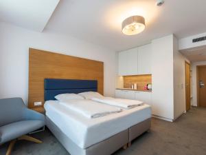 Posteľ alebo postele v izbe v ubytovaní VacationClub – Seaside Apartament 451