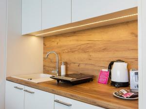 Kuchyňa alebo kuchynka v ubytovaní VacationClub – Seaside Apartament 451 + 7 fotografií