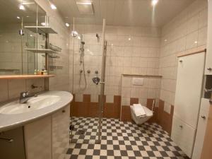 Kúpeľňa v ubytovaní Apartments Hohenberger Mallnitz - Mein Platz in den Bergen!
