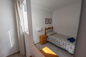 Posteľ alebo postele v izbe v ubytovaní Edificio Prieto VIV 3