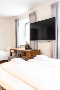 Postel nebo postele na pokoji v ubytování Hotel Wandinger Hof by Lehmann Hotels
