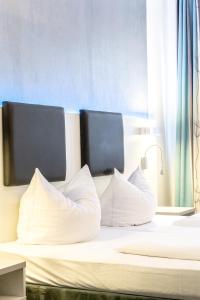 Postel nebo postele na pokoji v ubytování Hotel Wandinger Hof by Lehmann Hotels