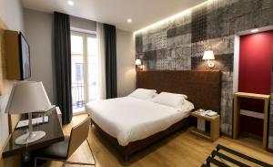 מיטה או מיטות בחדר ב-Best Western Ai Cavalieri Hotel