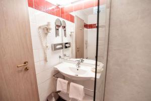 Koupelna v ubytování Best Western Plus Lido Hotel