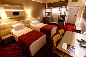 Postel nebo postele na pokoji v ubytování Best Western Plus Lido Hotel