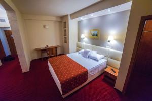 Postel nebo postele na pokoji v ubytování Best Western Plus Lido Hotel