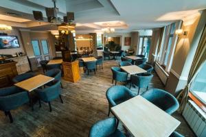 TV a/nebo společenská místnost v ubytování Best Western Plus Lido Hotel